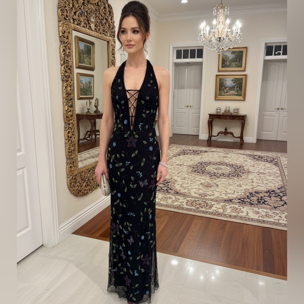 Beautiful hand, beaded and embroidered dress with low front and low back lace up